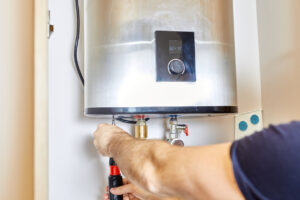 Man Fixing Water Heater